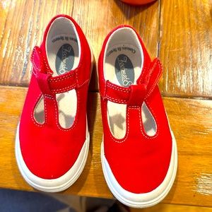 Red toddler girl sneakers with Velcro closure